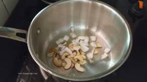 Roast cashew nuts , Raisins and coconut in Ghee