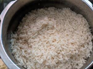 Step 2 - Add in the soaked basmati Rice