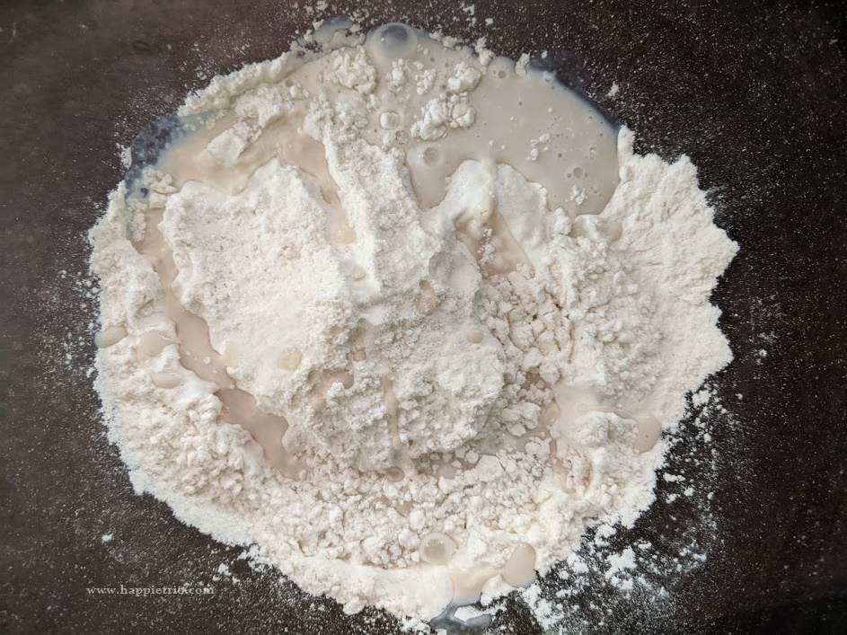  In a mixing bowl add in 2 cups of the flour along with ½ tsp of salt. Now add the yeast milk to the flour.