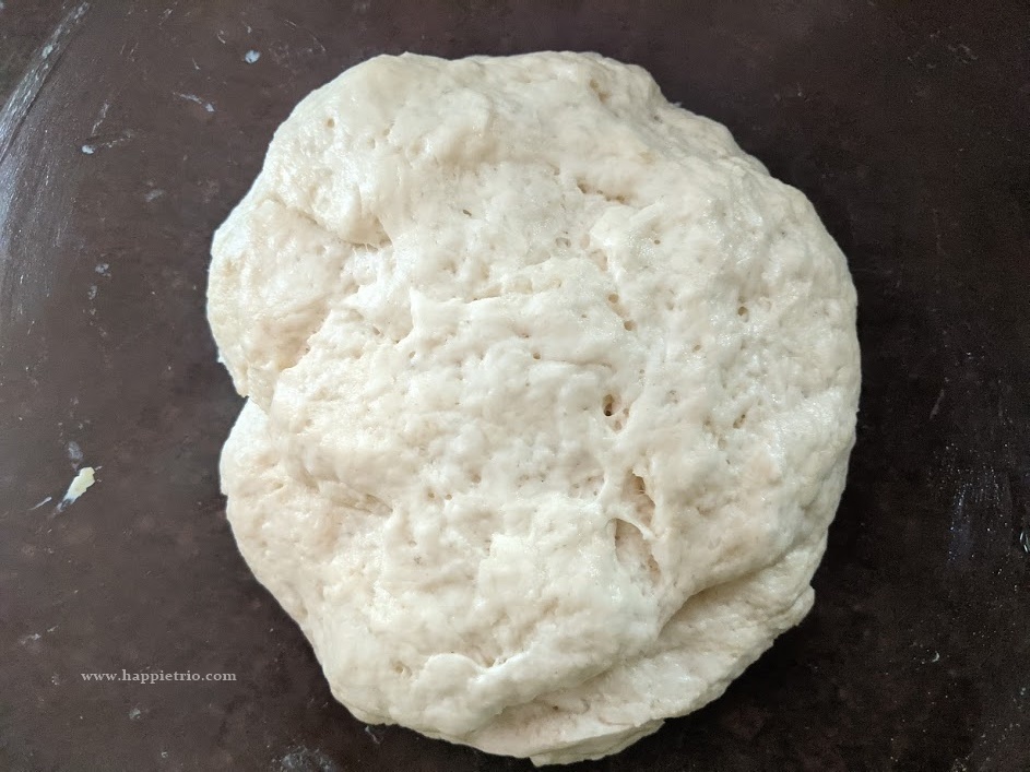 After 90 mins the dough would have doubled in size. Knead once to release the air.