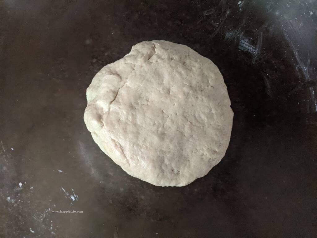  Now add in the 2 tbsp of oil and knead the dough once again. Knead the dough at least for 10mins. If you have a Stand mixer make sure you use it. Cover the dough with a kitchen towel for 30 mins.