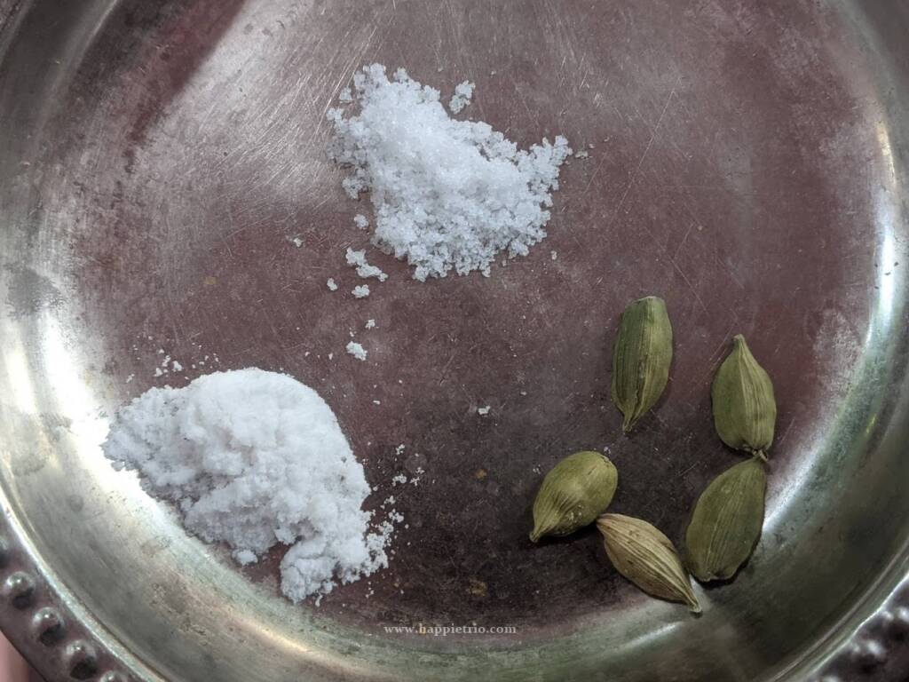 Next add in cooking soda, Salt, and cardamom pods.
