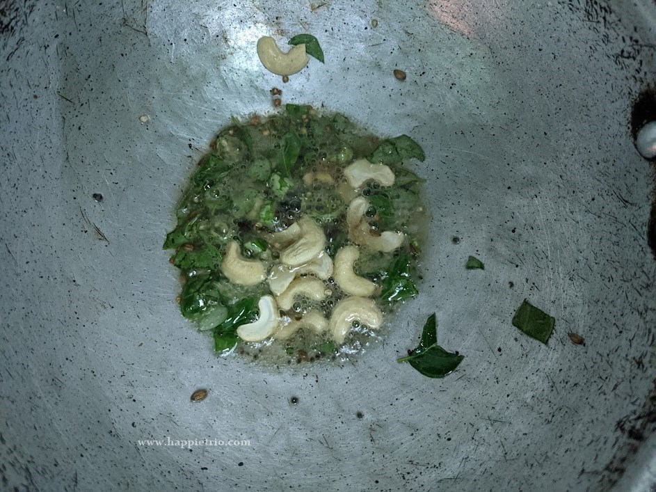 In the same Pan add in Oil. Once the oil heats up add in Mustard Seeds and Cumin seeds wait till they splutter and then add Urad Dal, Peppercorns, finely chopped ginger, and Green Chilli. Next, add in Chopped Cashew nuts and finely chopped Curry Leaves.