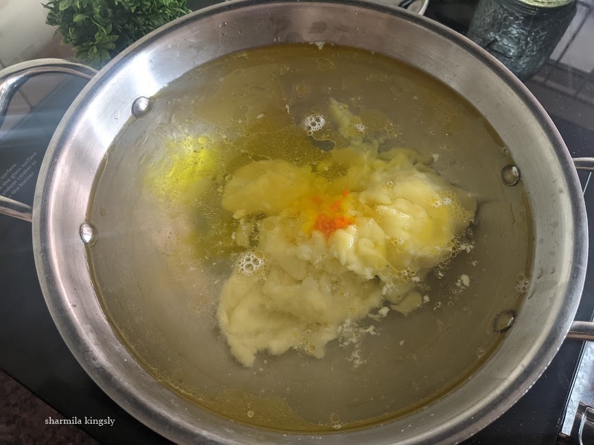  add in the Mango Pulp and food color if using and mix well until there are no lumps.
