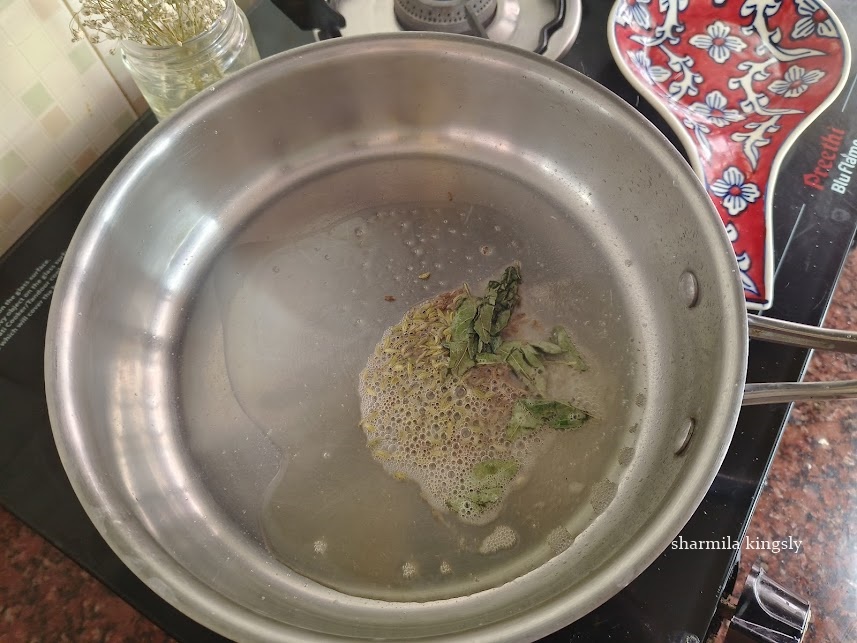 Heat oil in a pan once it heats up add in Cumin seeds, Fennel seeds, Curry leaves.