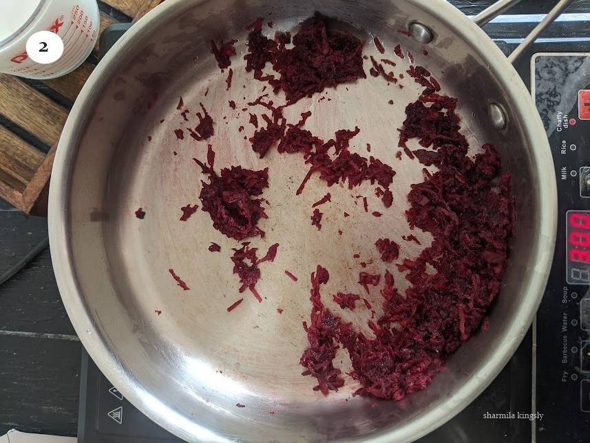 In the same pan add grated beetroot. Sauté in low flame until the raw smell leaves and its cooked.