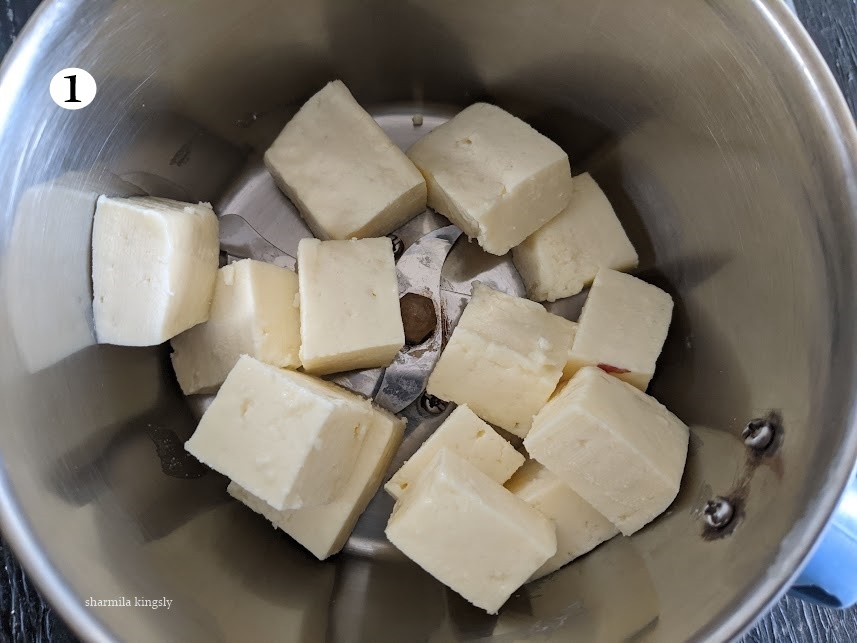 Wash the paneer really well and chop them into cubes. Add the cubed paneer in a blender