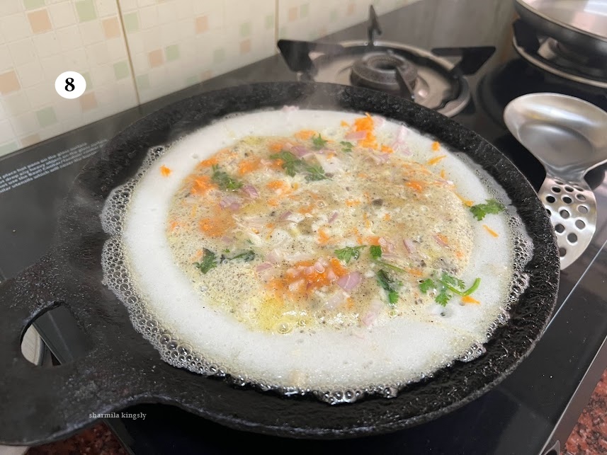  Drizzle oil over the dosa and cook for 30 secs or until its cooked in medium flame. You can also cover and cook if you prefer.