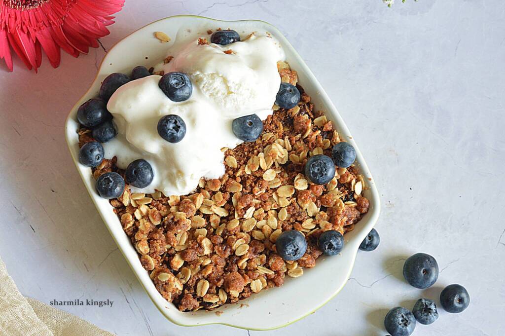 Let the blueberry crisp cool completely and then serve with a scoop of ice cream.