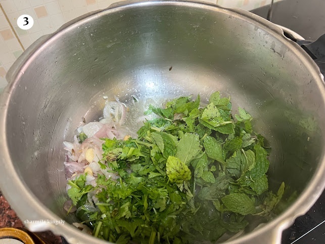 And then add Mint and coriander leaves. Saute till they shrink. Cook in a medium flame.